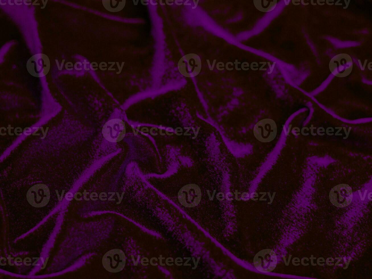 lila Samtstoffstruktur als Hintergrund verwendet. leerer lila stoffhintergrund aus weichem und glattem textilmaterial. Es gibt Platz für Text. foto