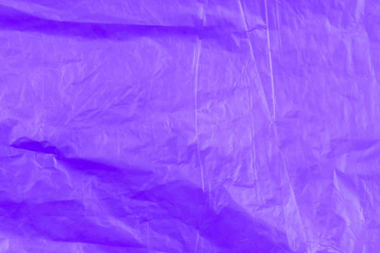 abstrakte Textur des lila Cellophan-Müllsacks foto