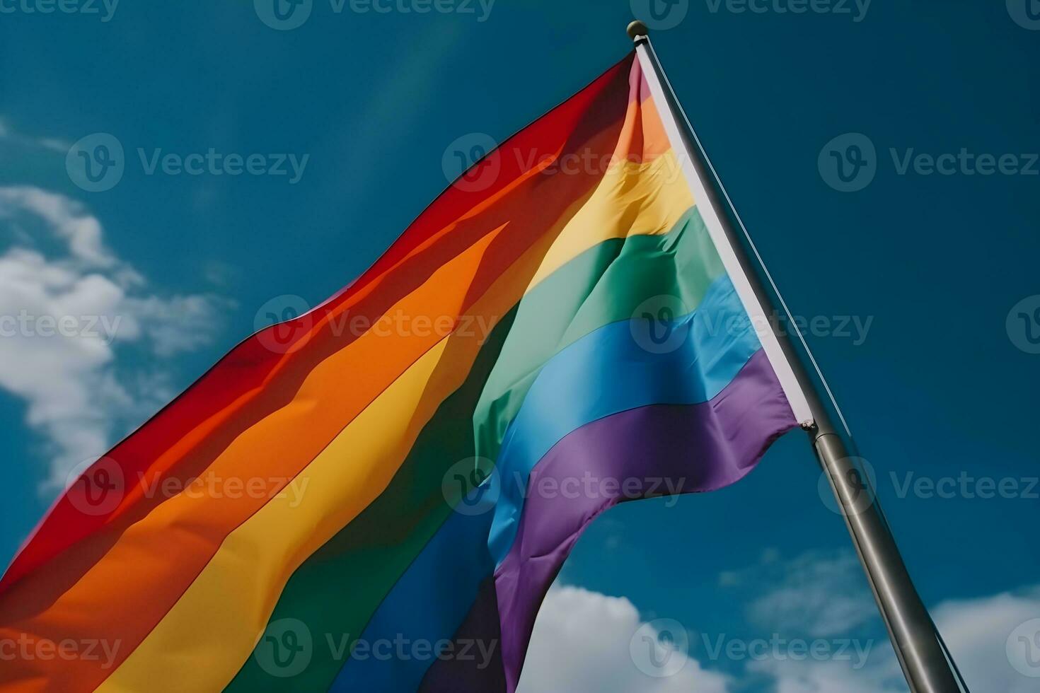 ein Regenbogen Flagge winken im das Wind foto