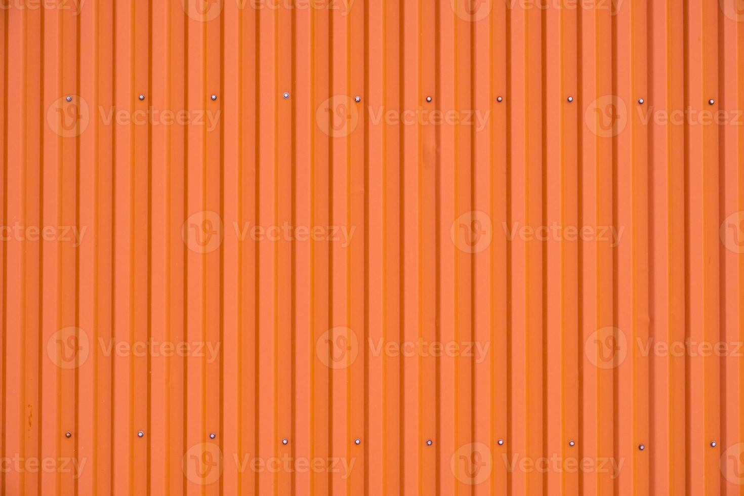 gestreifte Textur und Hintergrund der orangefarbenen Behälterreihe foto