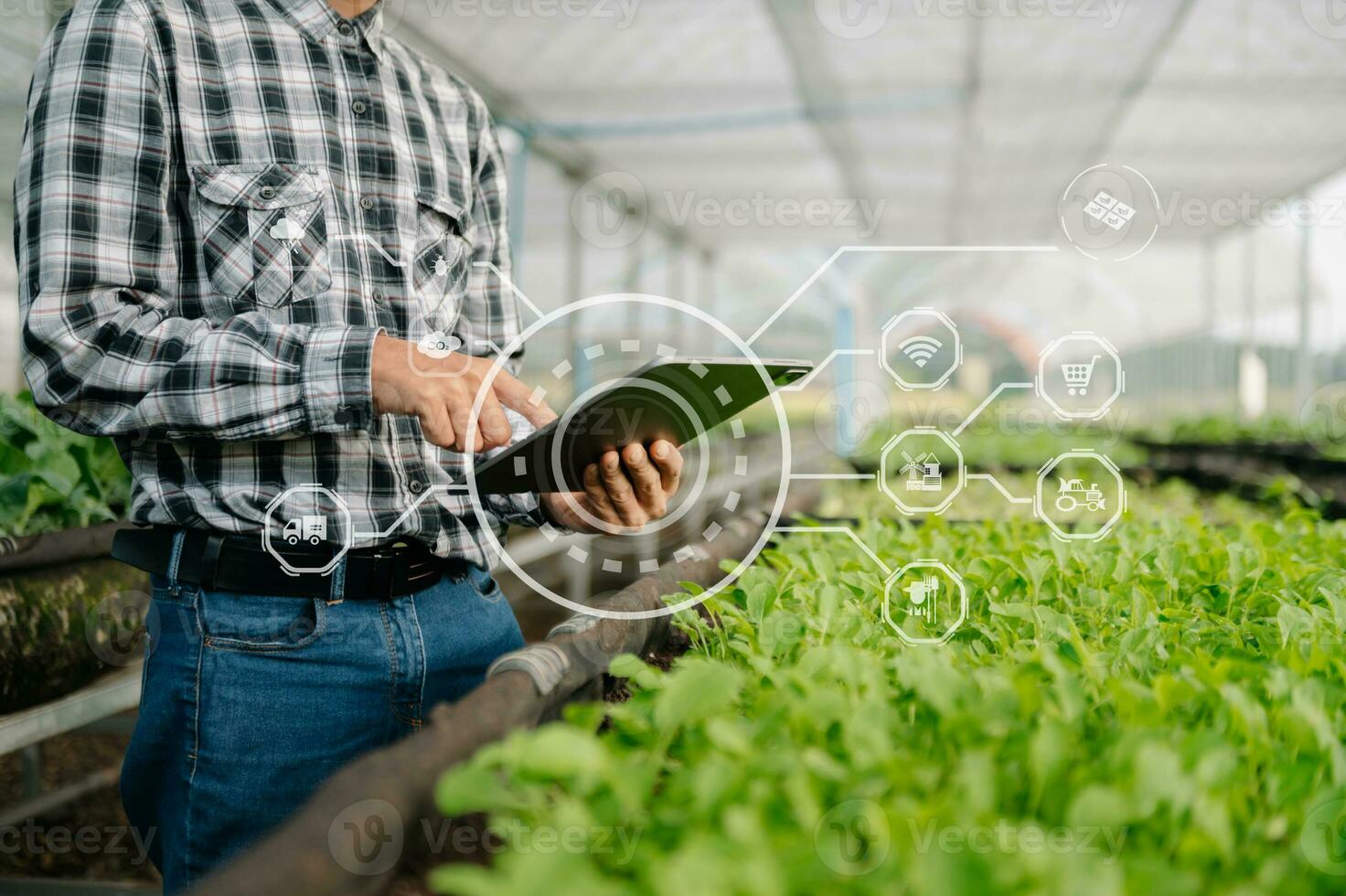 smart farmer mit anwendung von tablet-konzepten moderner landtechnik und visueller symbol.intelligenter landwirtschaft foto