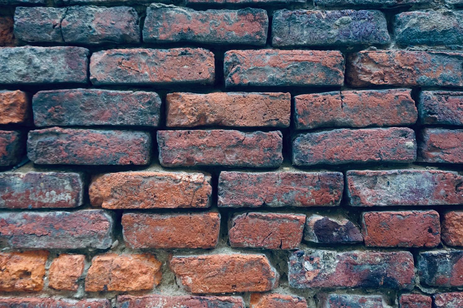 strukturierter Hintergrund der alten blauen Steinmauer foto