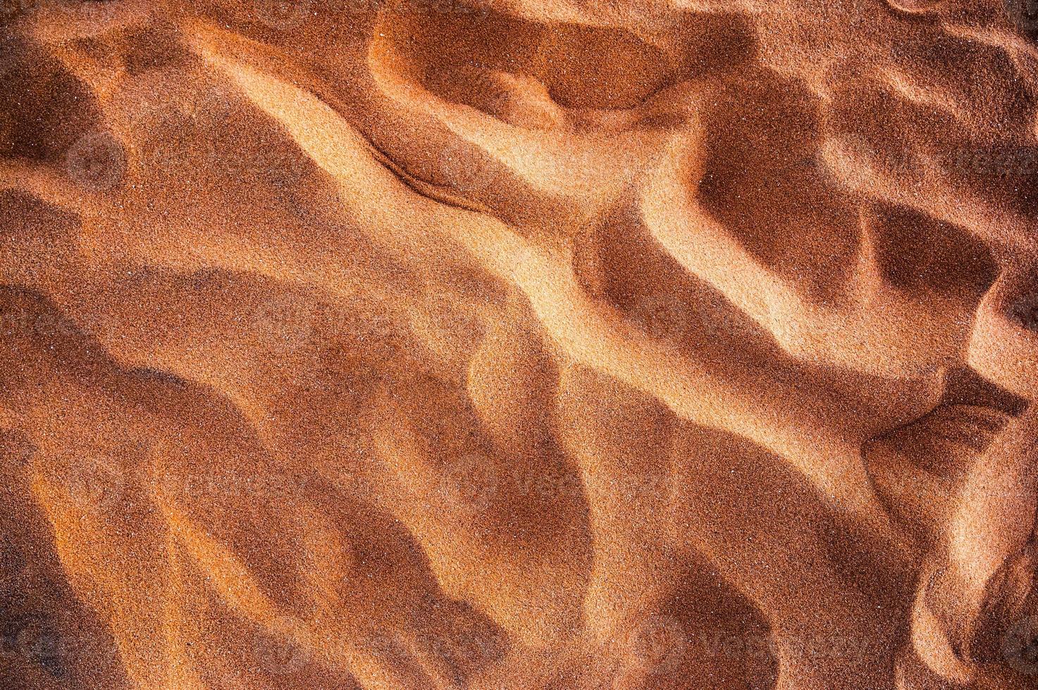 goldener rauer Sand natürlicher Hintergrund foto