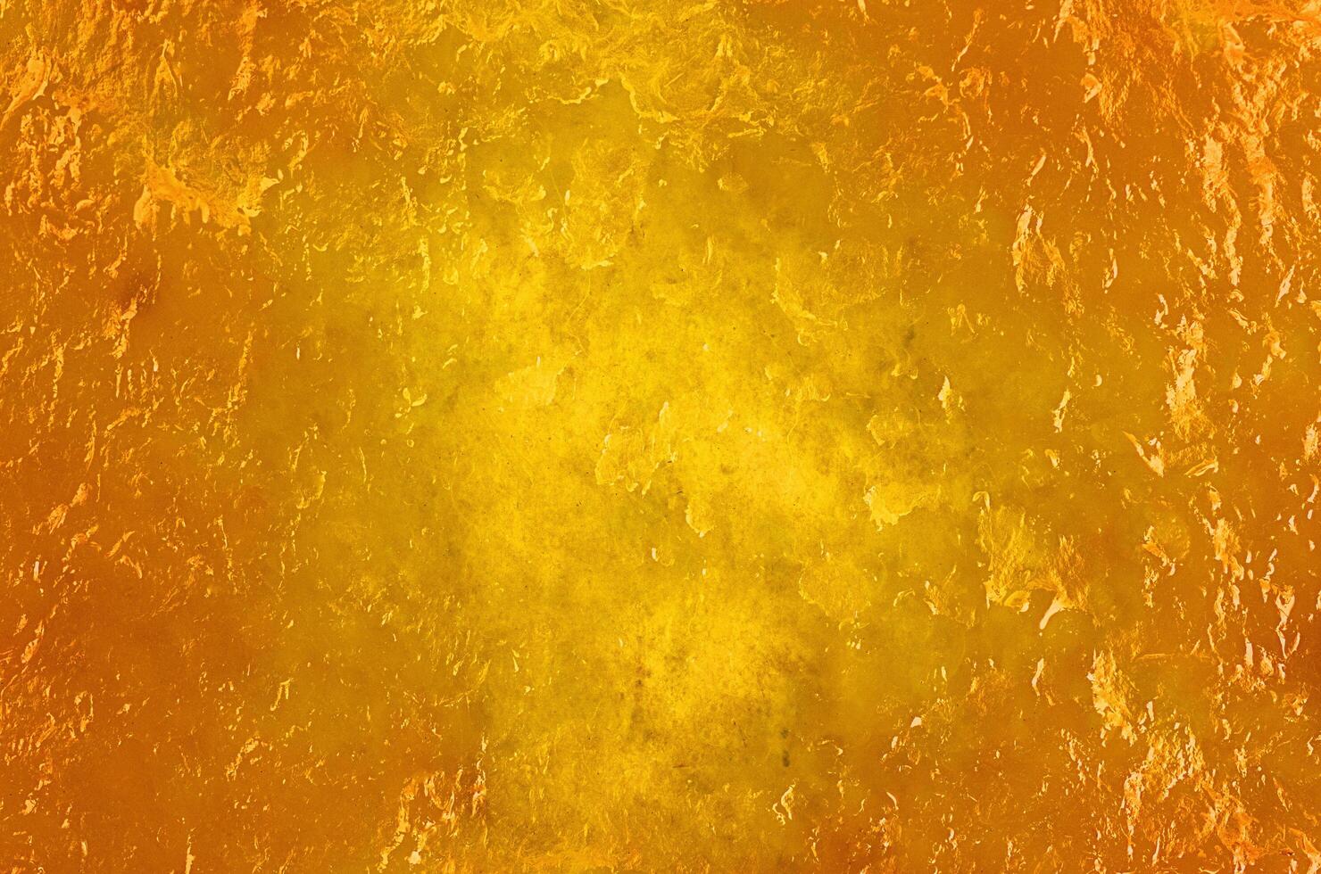 Goldfarbener abstrakter Hintergrund mit getrockneten Mango-Texturen foto