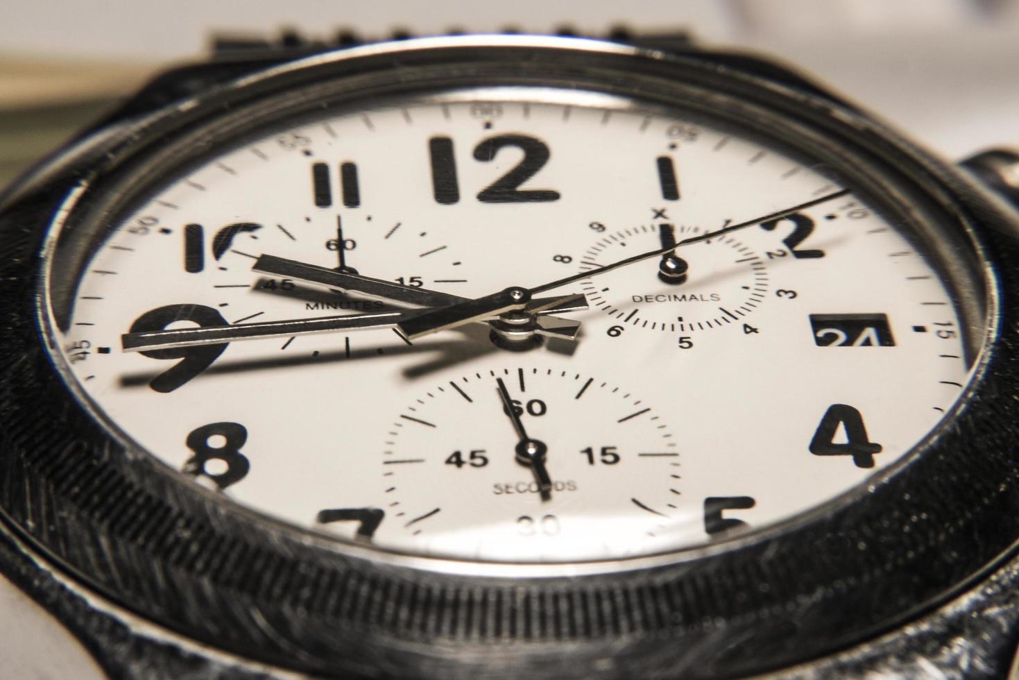 Tapete mechanische Uhren mit Pfeilen Chronograph foto