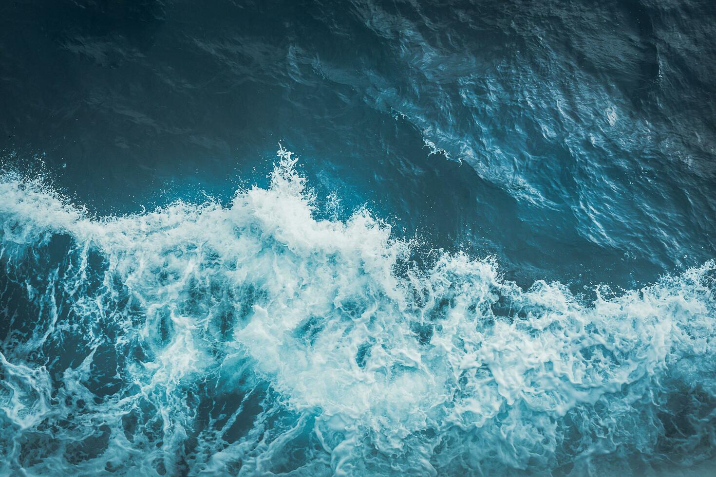 Aussicht von über Türkis Ozean Wellen Hintergrund. foto
