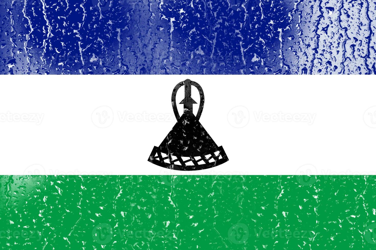 3d Flagge von Lesotho auf ein Glas foto