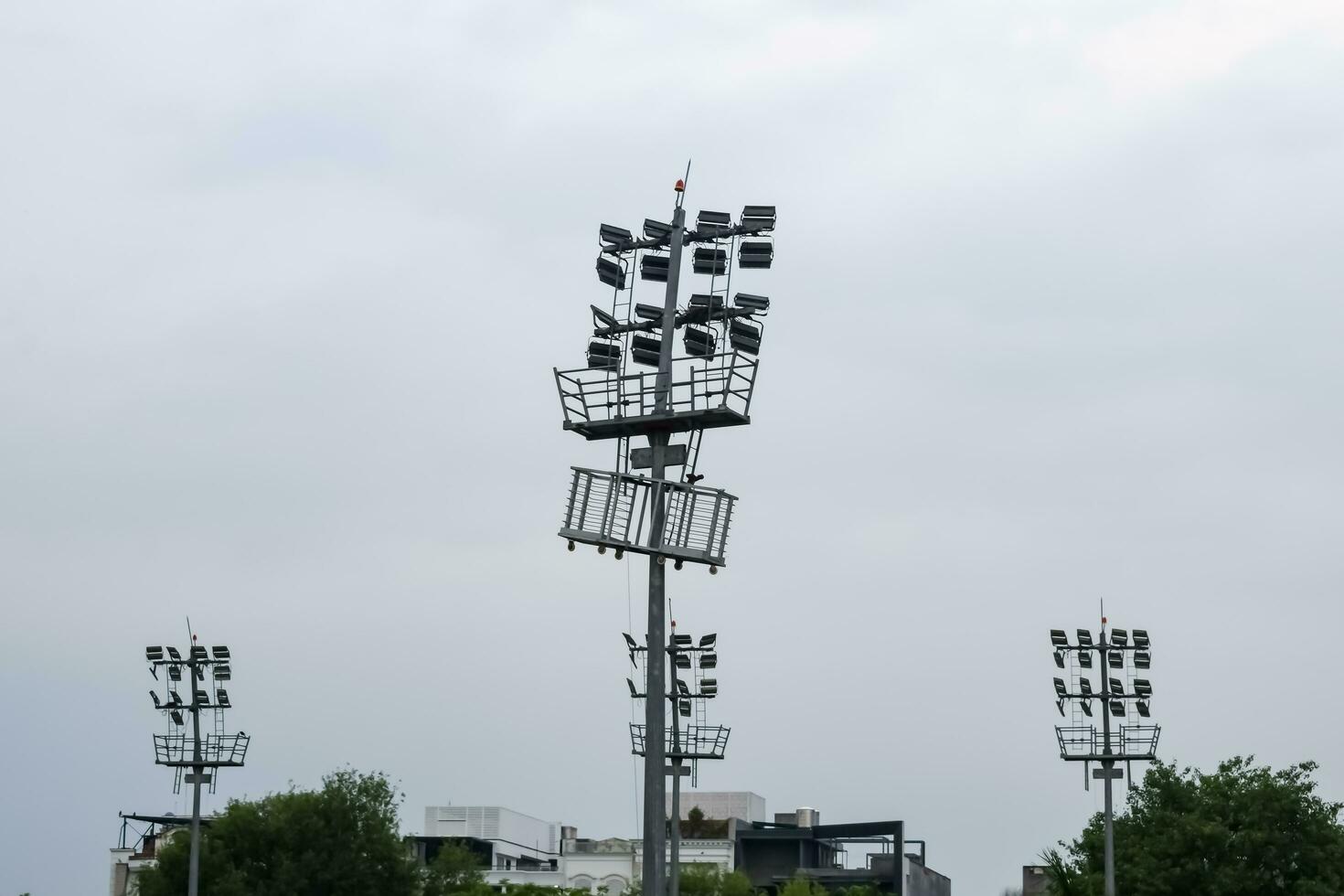 Kricket Stadion Flut Beleuchtung Stangen beim Delhi, Indien, Kricket Stadion Beleuchtung foto