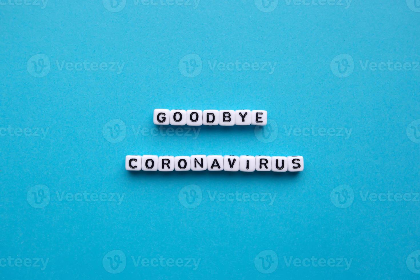 Auf Wiedersehen Coronavirus, auf blauem Hintergrund foto