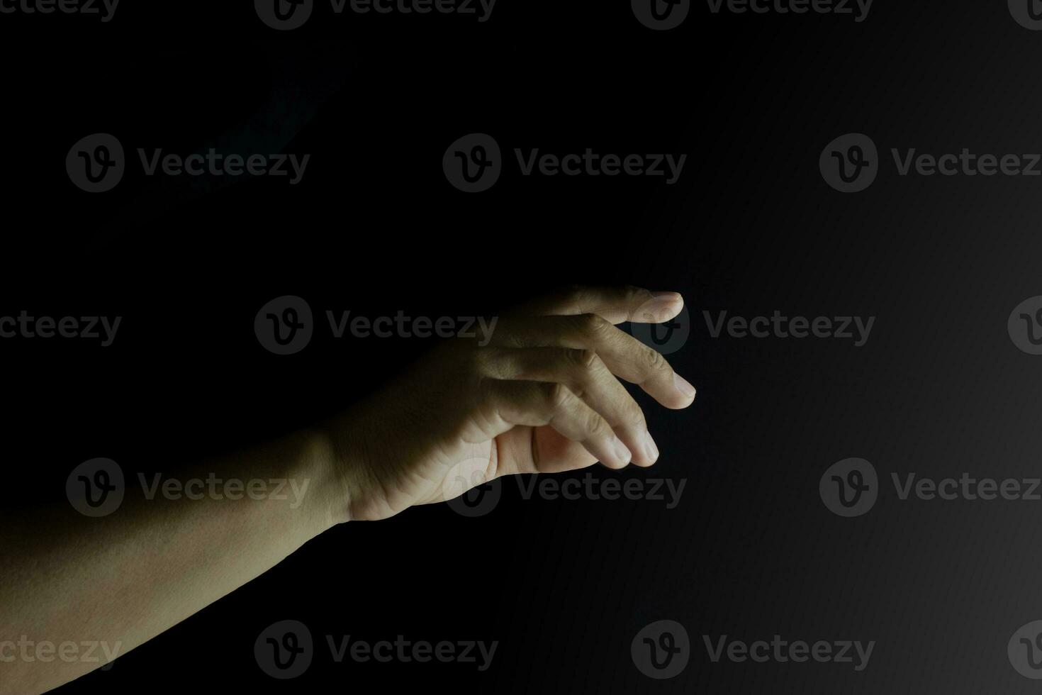 Hand auf schwarz Hintergrund foto