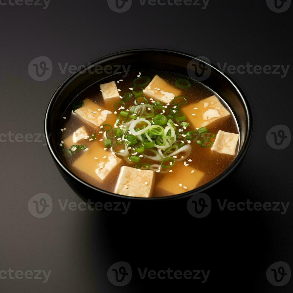 Essen Fotografie von Miso Suppe auf schwarz Schüssel isoliert auf dunkel Hintergrund. generativ ai foto