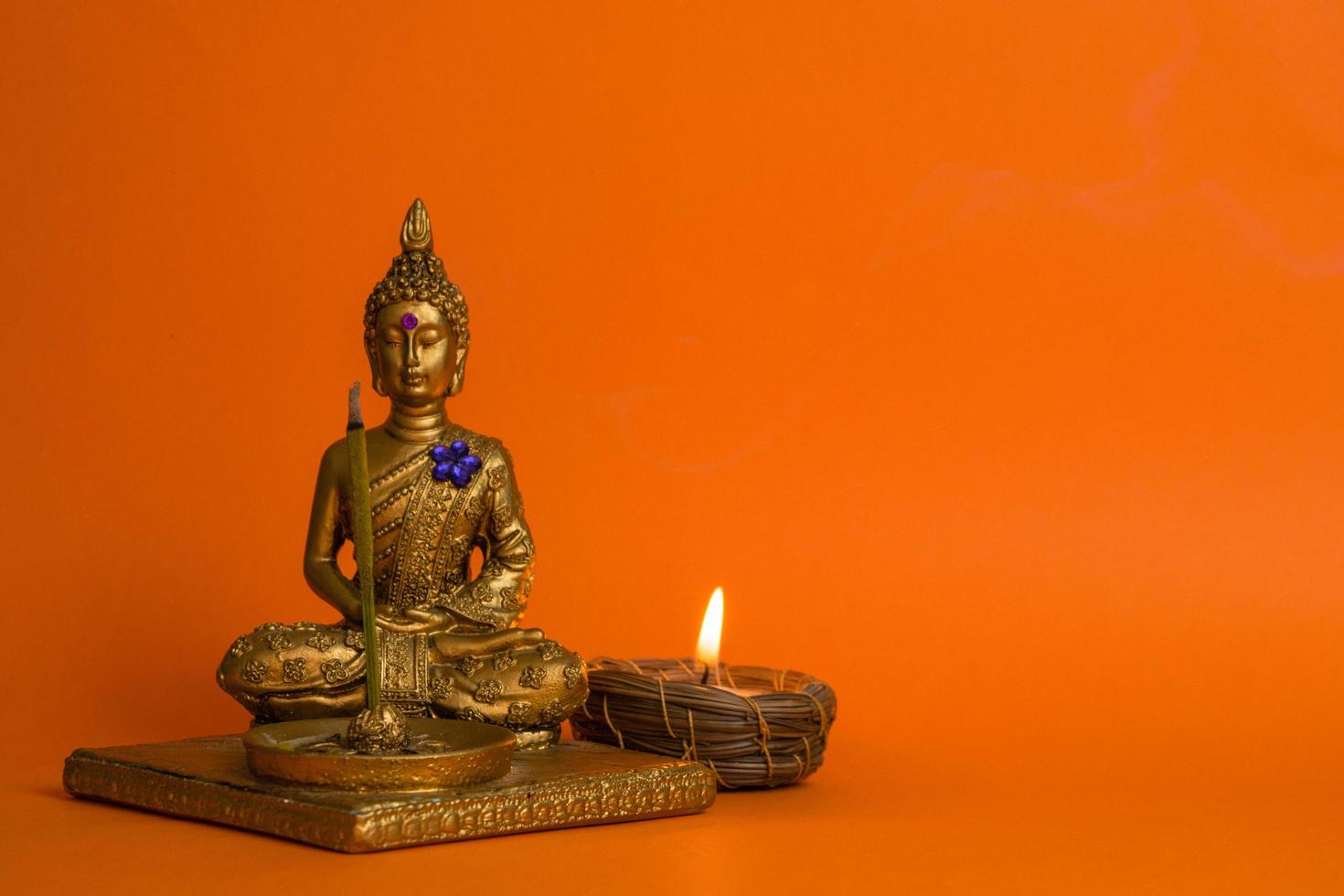 Buddha- und Kerzenhandwerk candle foto