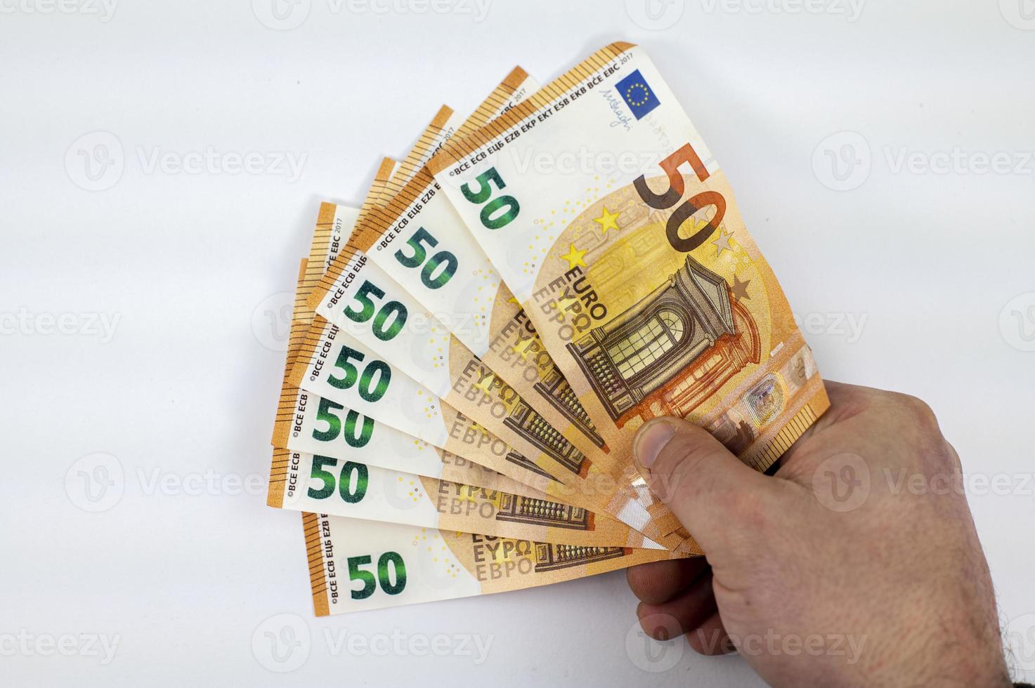 Hand des Mannes mit 50-Euro-Fan foto
