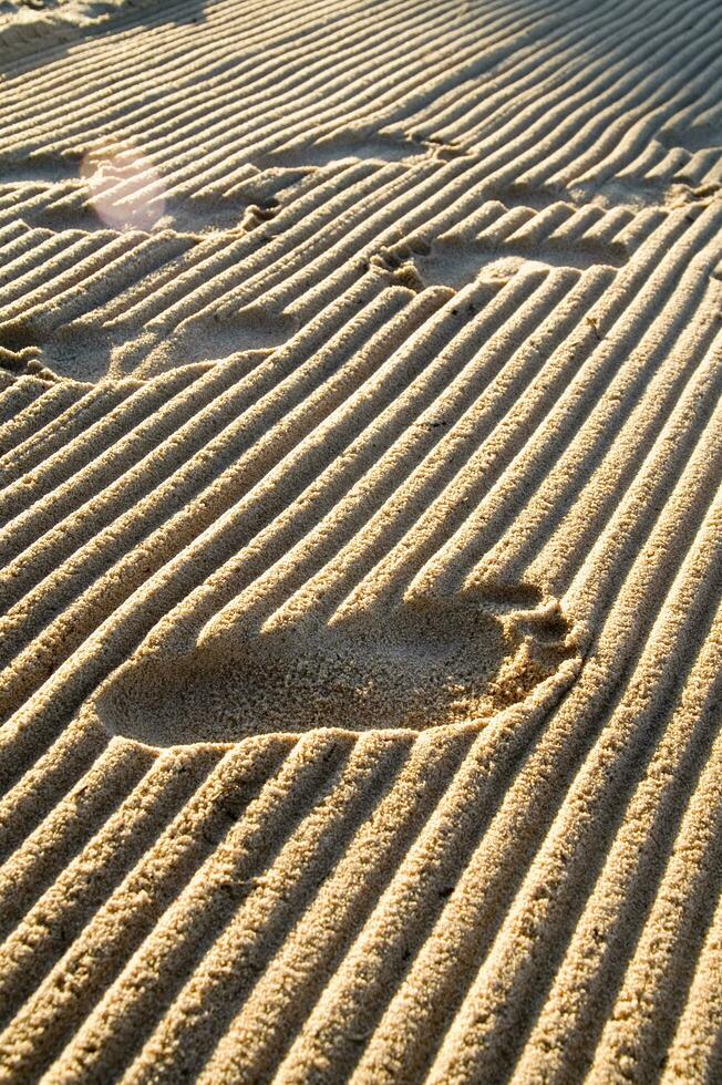 Fußabdrücke im Sand foto