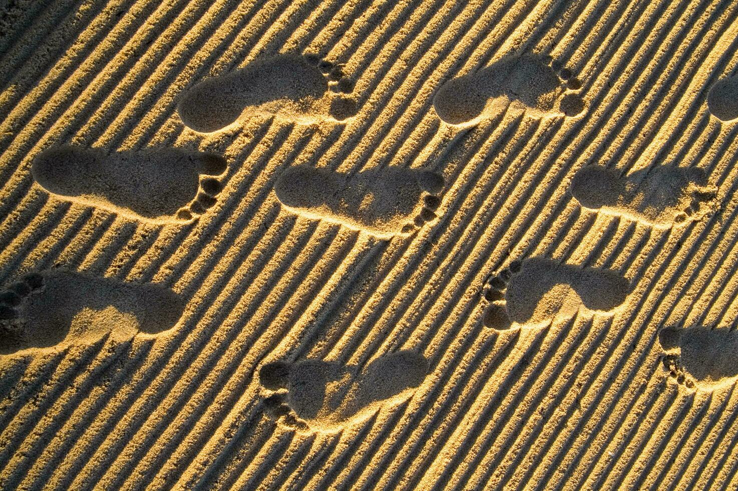 Fußabdrücke im Sand foto