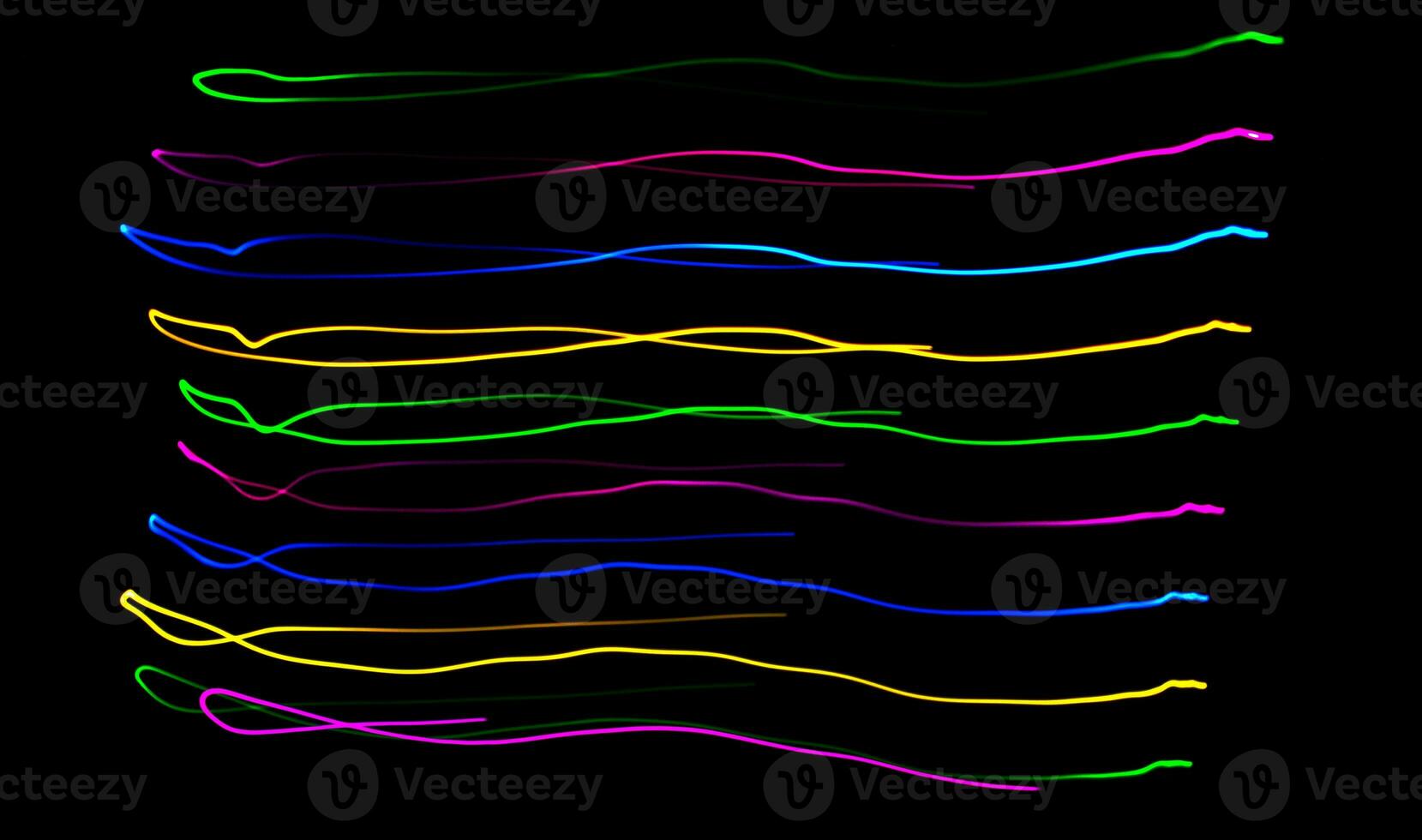 multi Farbe Licht Gemälde Fotografie, Strudel und Kurve von Blau, Grün und rot Licht gegen ein schwarz Hintergrund. foto