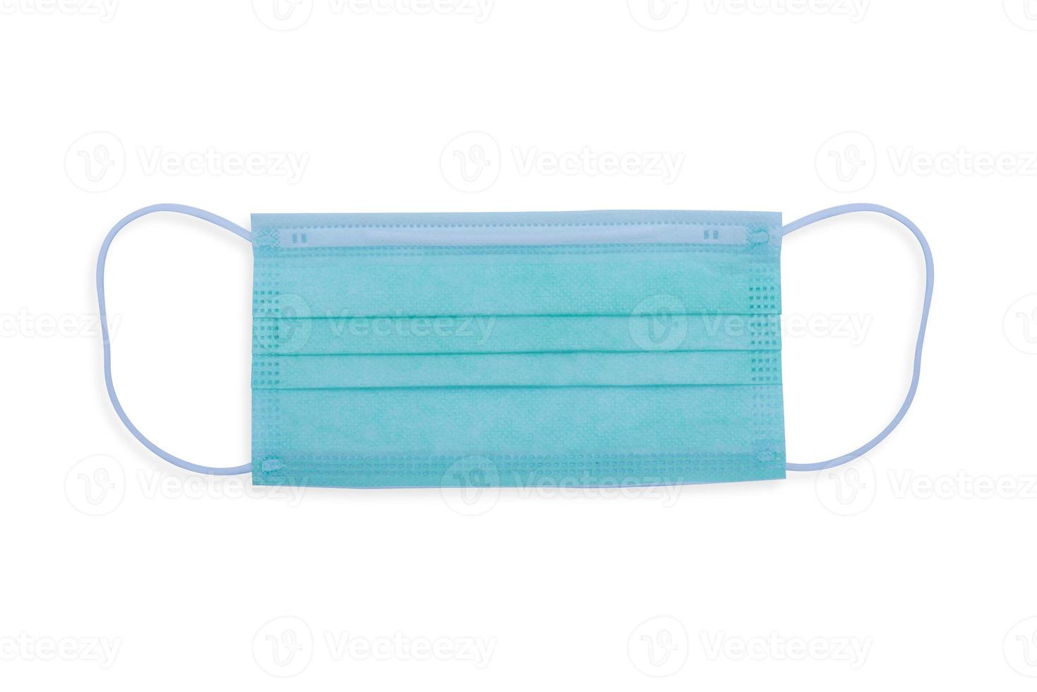 medizinische Maske blau-weißer Hintergrund foto