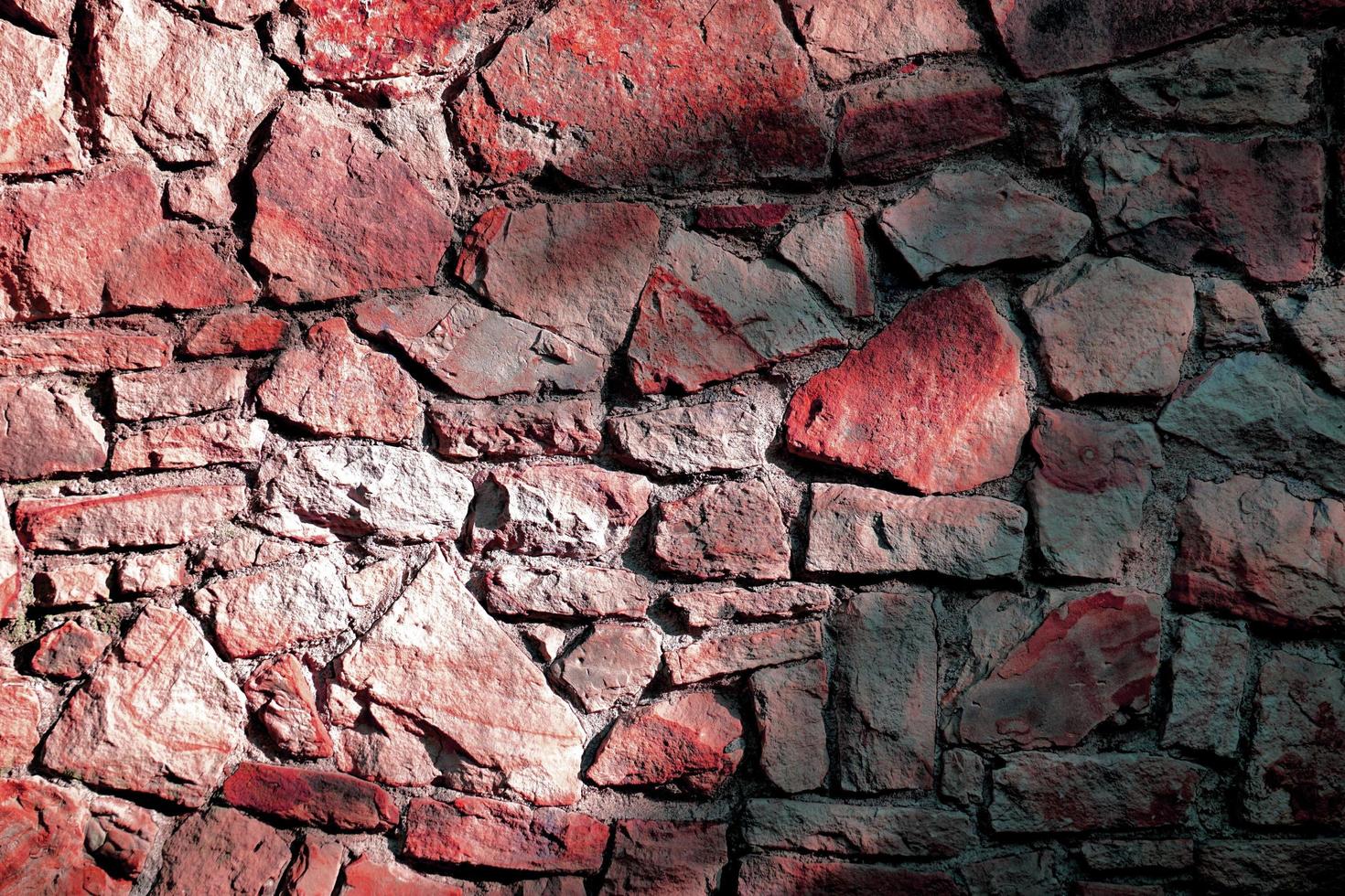 alter gebrochener steinmauer abstrakter hintergrund foto