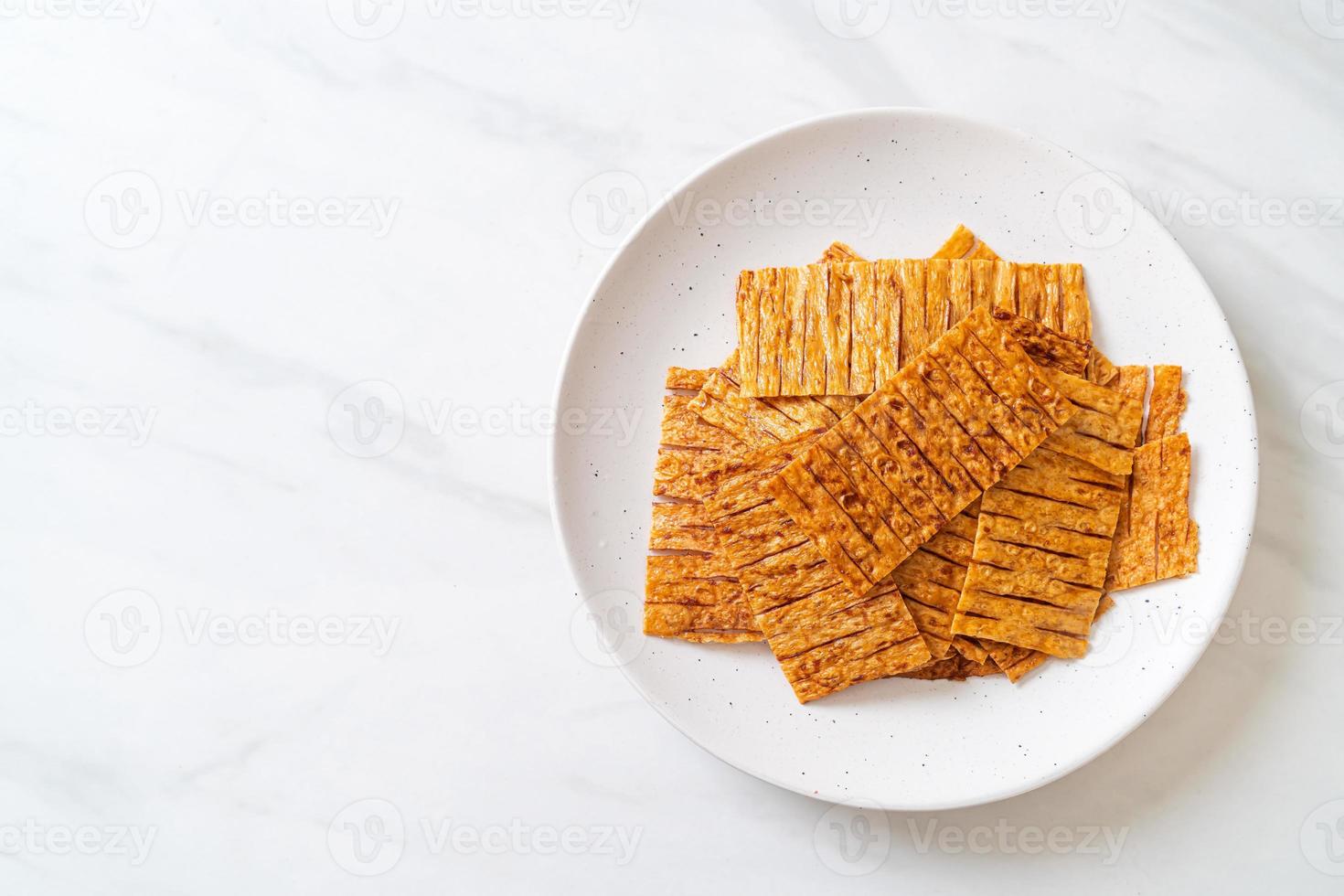 Tintenfisch-Meeresfrüchte-Snack auf dem Teller foto