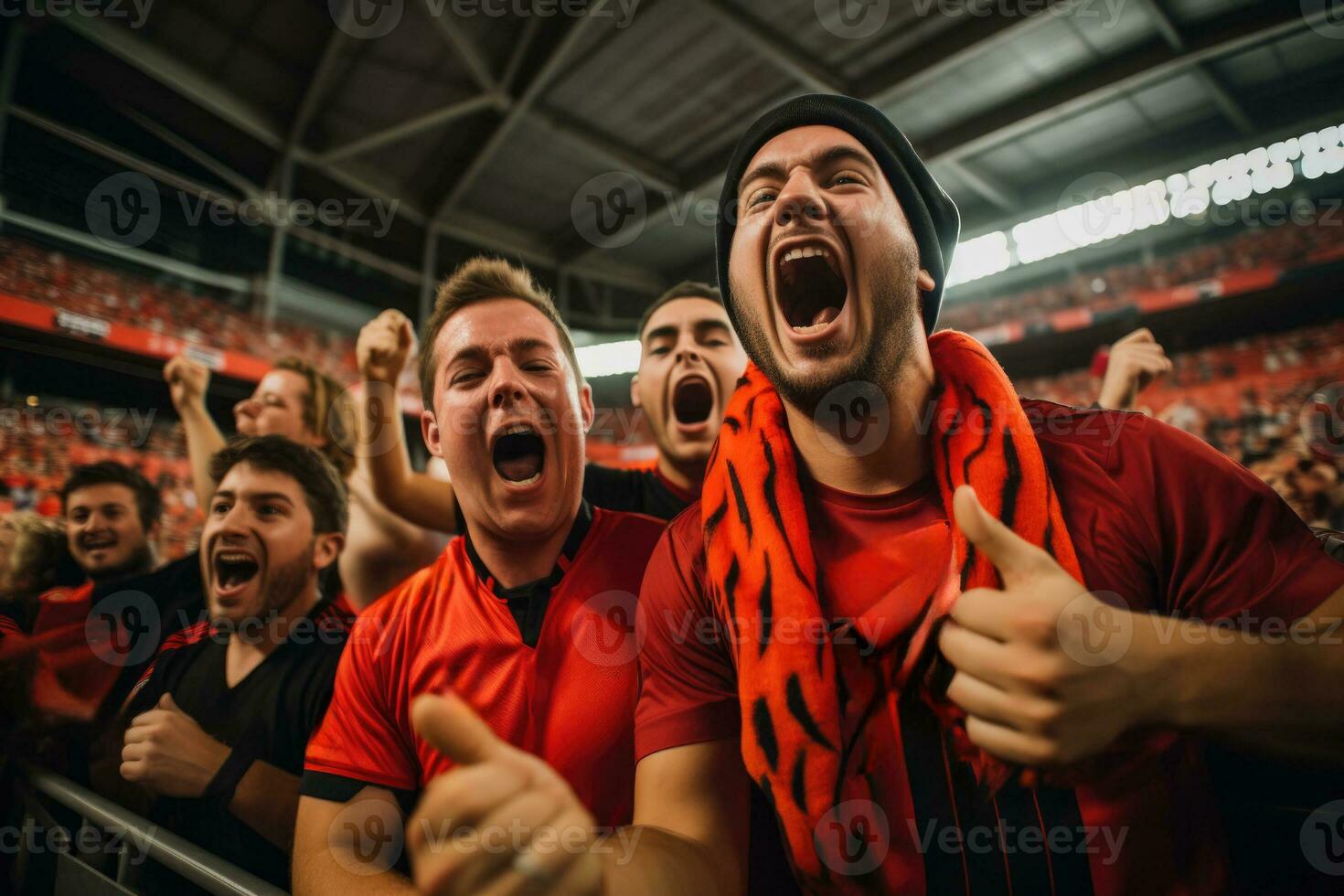 ein Gruppe von leidenschaftlich Fans brüllen im Aufregung wie das Fußball Jahreszeit Tritte aus mit ein spannend Spiel foto
