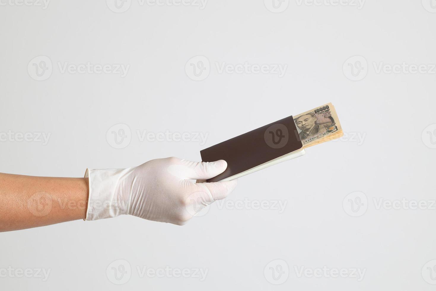 Hand mit medizinischen Handschuhen foto