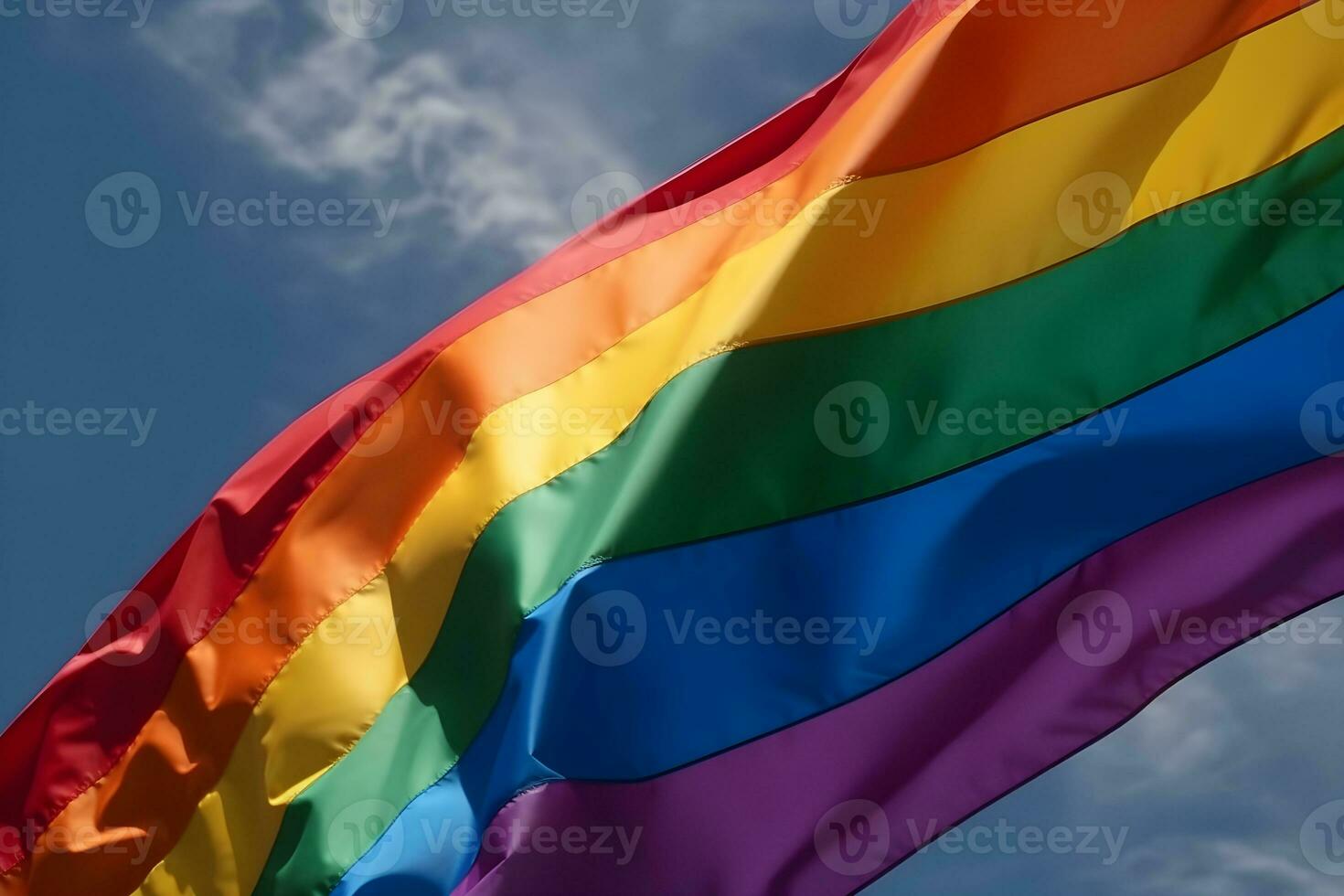 ein Regenbogen Flagge winken im das Wind foto