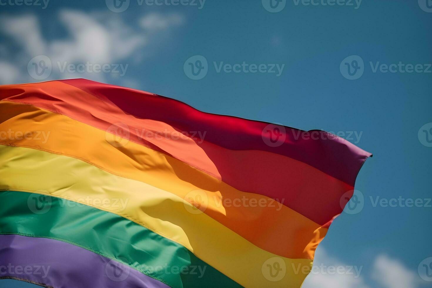 ein Regenbogen Flagge winken im das Wind foto