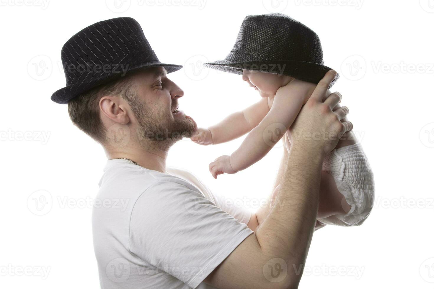 komisch Vater und Kind im klassisch Hüte. Vater und wenig Sohn. foto