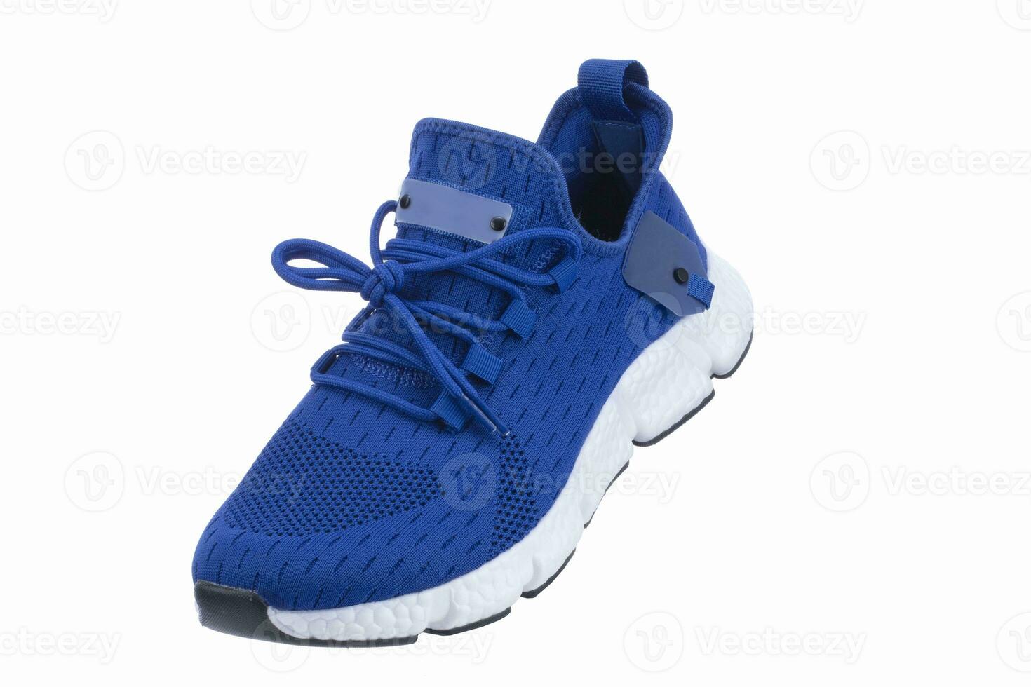Blau Sneaker gemacht von Stoff mit ein Weiß Sohle, einzig, alleinig auf ein Weiß Schuh. foto
