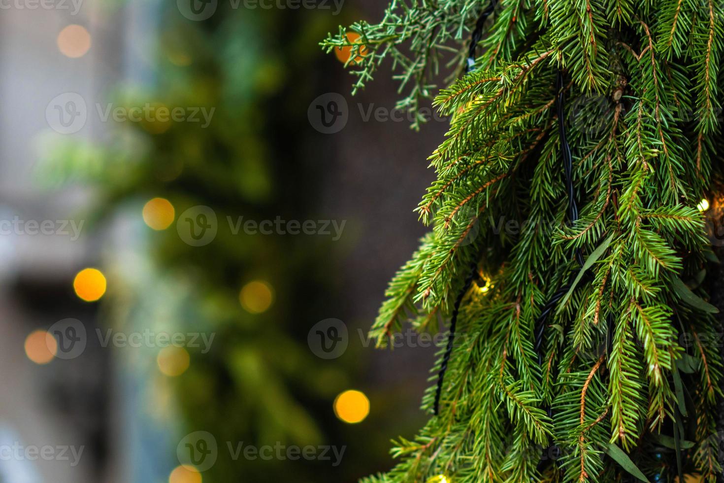 Nahaufnahmefoto. Weihnachtsschmuck und Lichter. foto