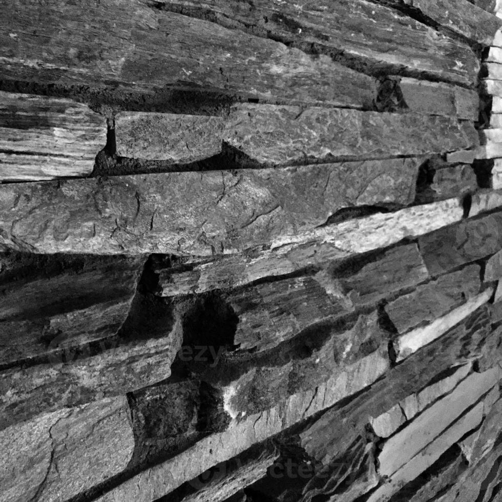 alte strukturierte Backsteinmauer aus stilvollen Steinen für Wohnkultur foto