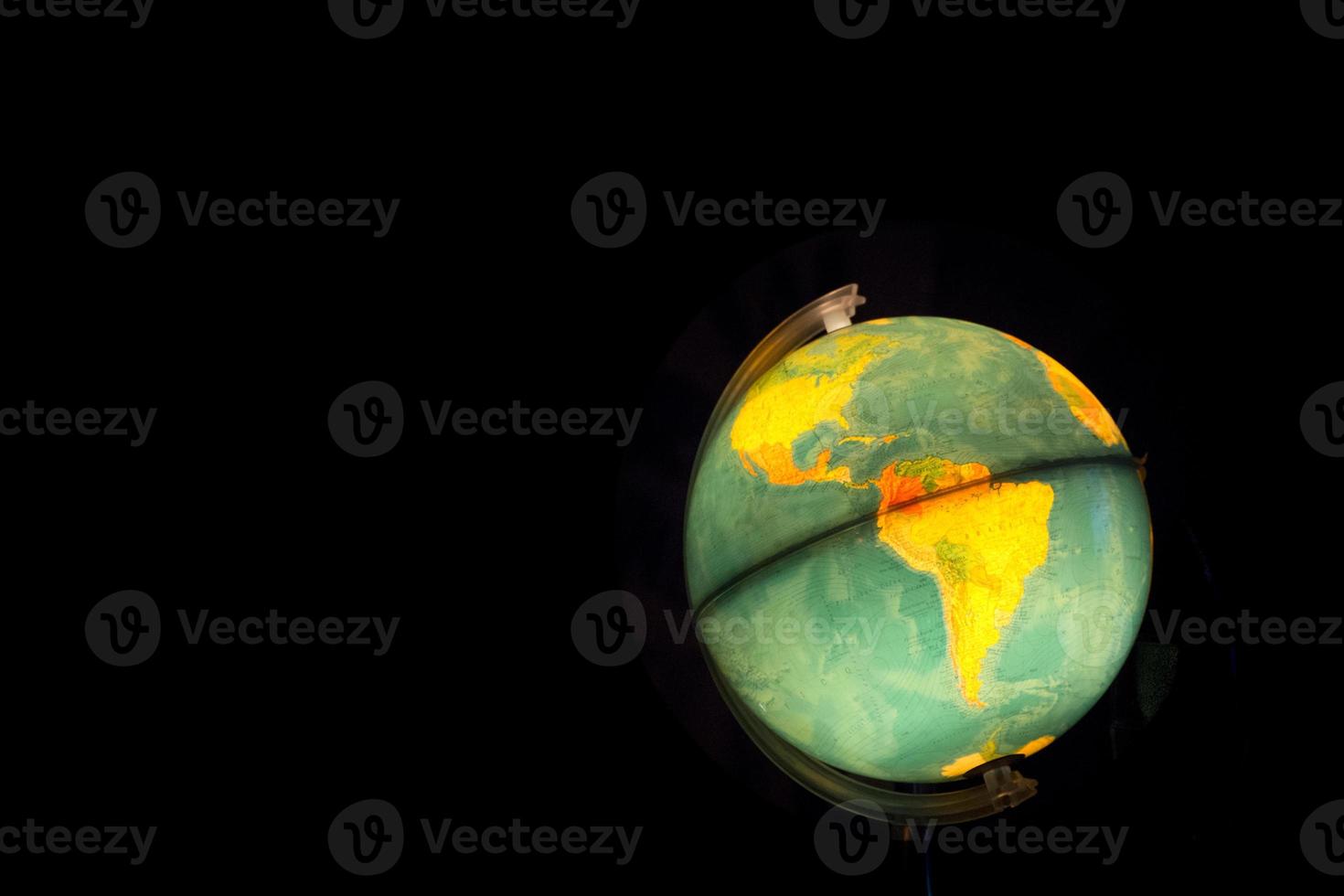 Globus auf schwarzem Hintergrund foto