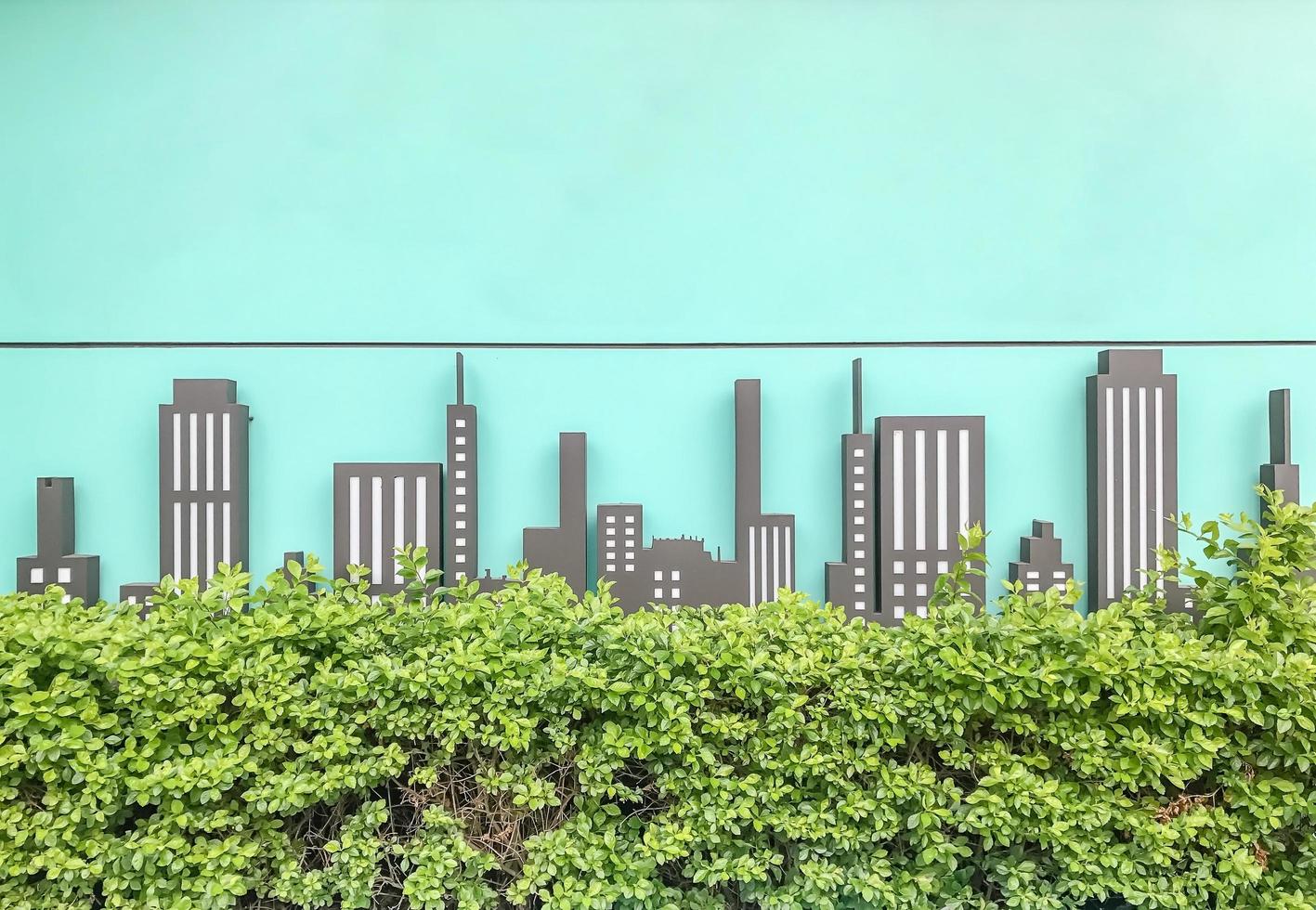 modernes Gebäude Stadtrahmen auf grüner Wand foto