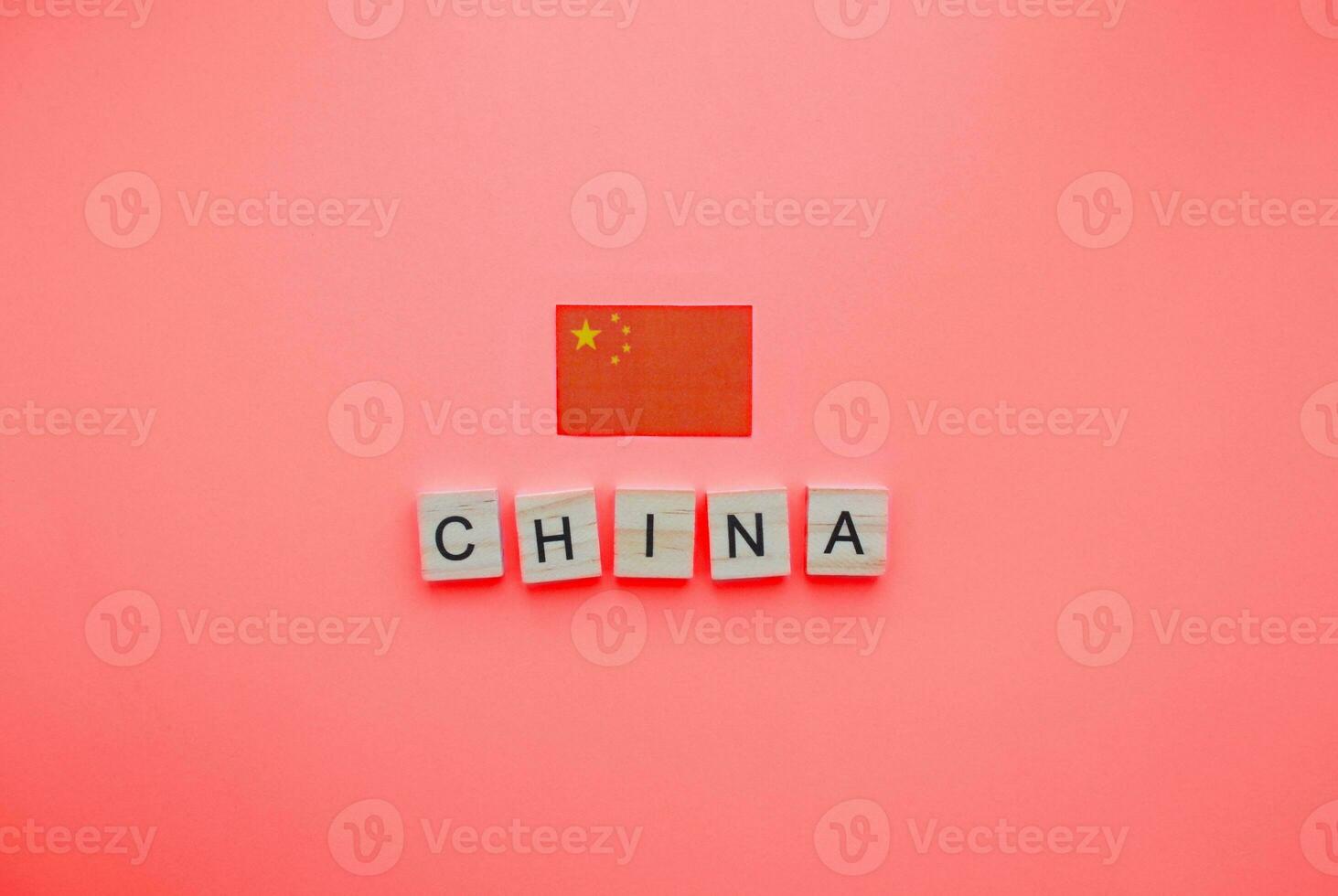 Oktober 1, National Tag im China, das Flagge von China, ein minimalistisch Banner mit ein Inschrift im hölzern Briefe foto