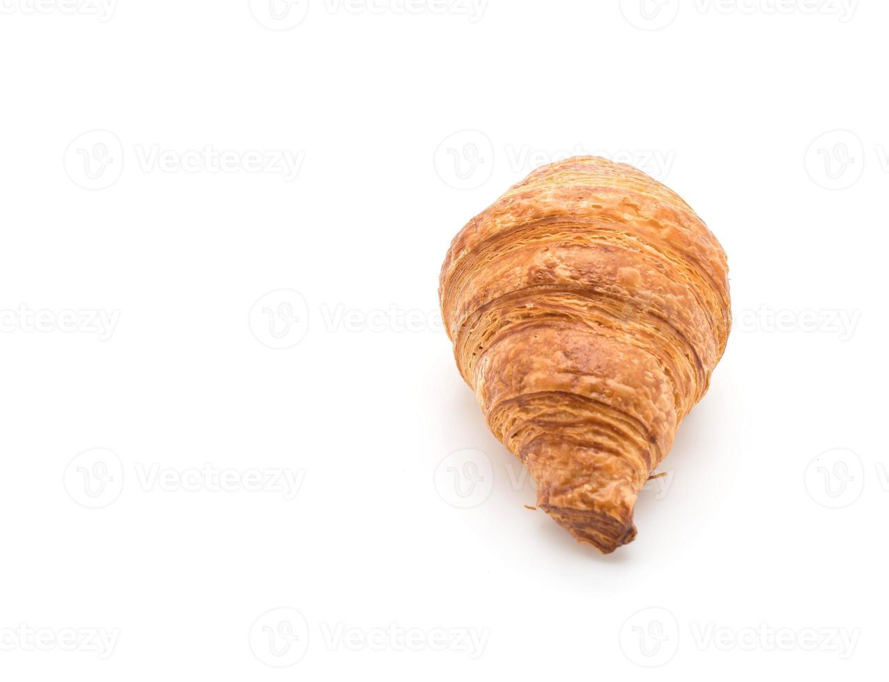 Buttercroissant auf weißem Hintergrund foto