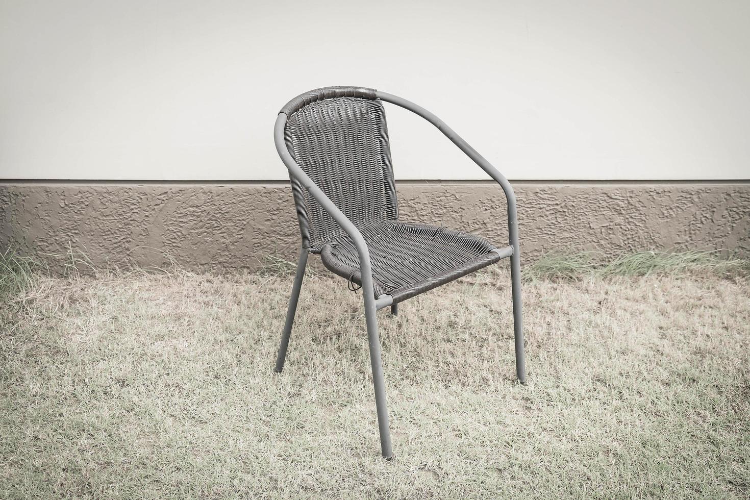 Stuhl mit leerer Wand für Kopienraum - Vintage-Effektfilter foto
