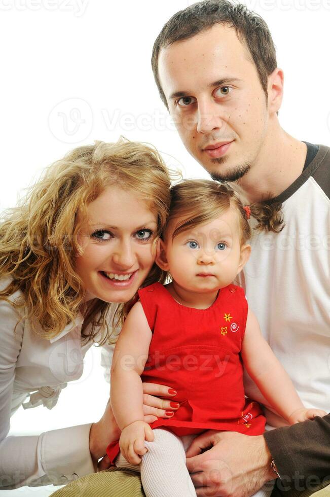 glückliche junge Familie zusammen im Studio foto