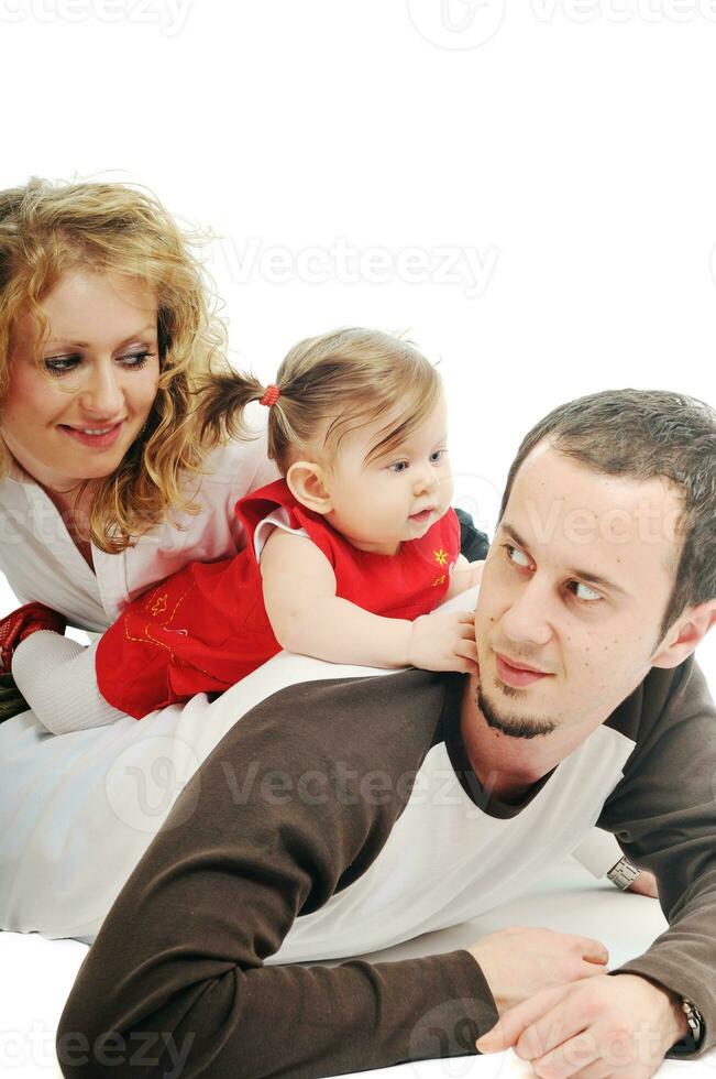 glückliche junge Familie zusammen im Studio foto