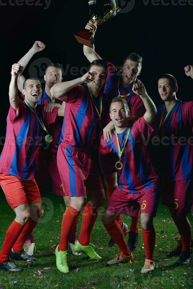 Fußballspieler feiern den Sieg foto