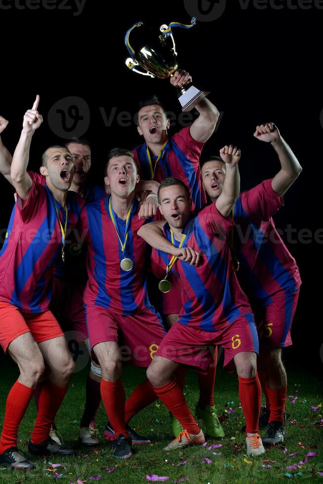 Fußballspieler feiern den Sieg foto