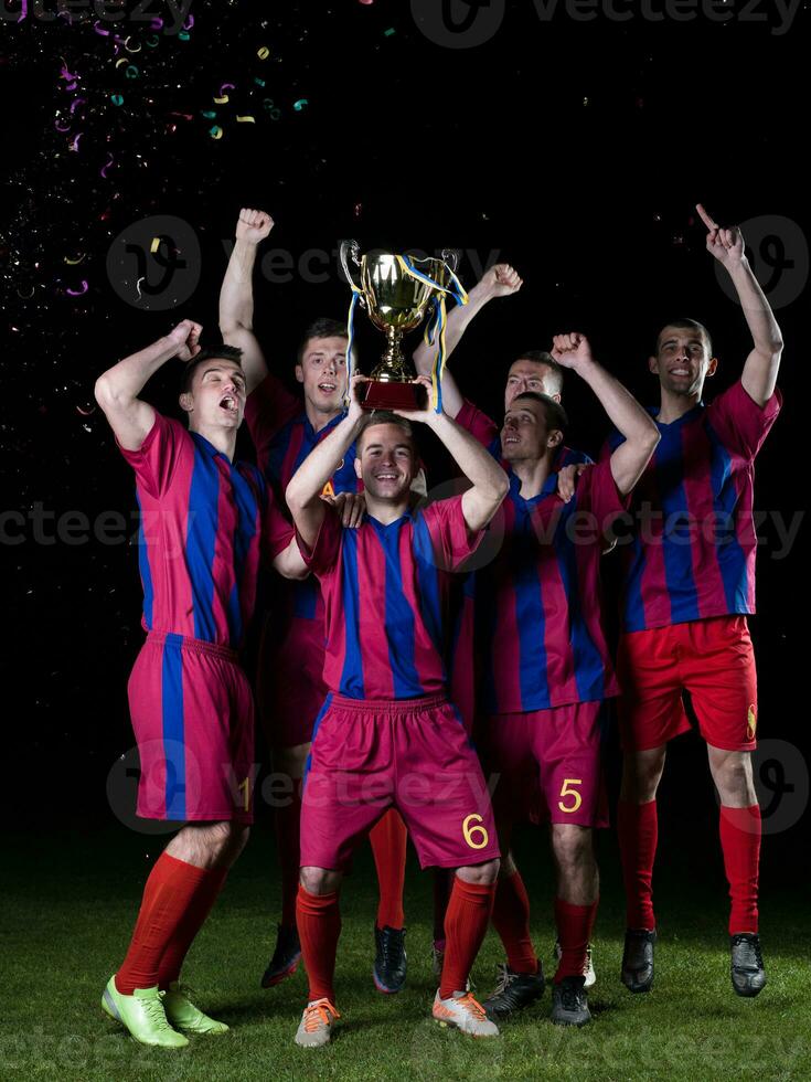 Fußballspieler feiern den Sieg foto