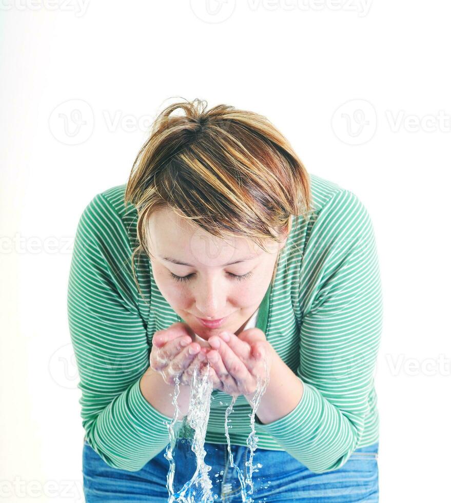 Frau Gesicht waschen foto