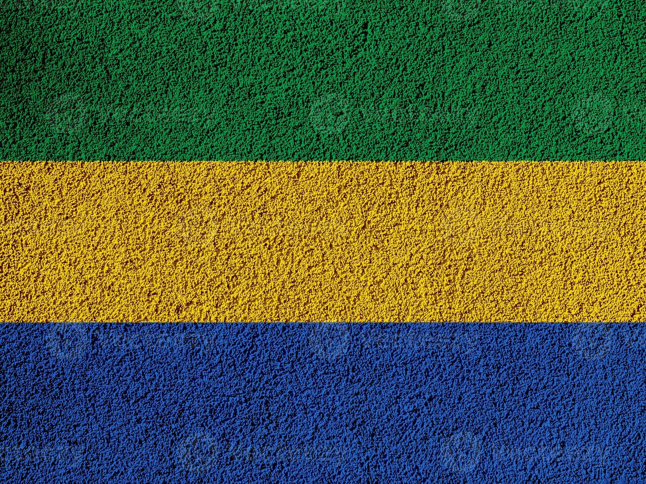 Flagge von Republik von gabon auf ein texturiert Hintergrund. Konzept Collage. foto