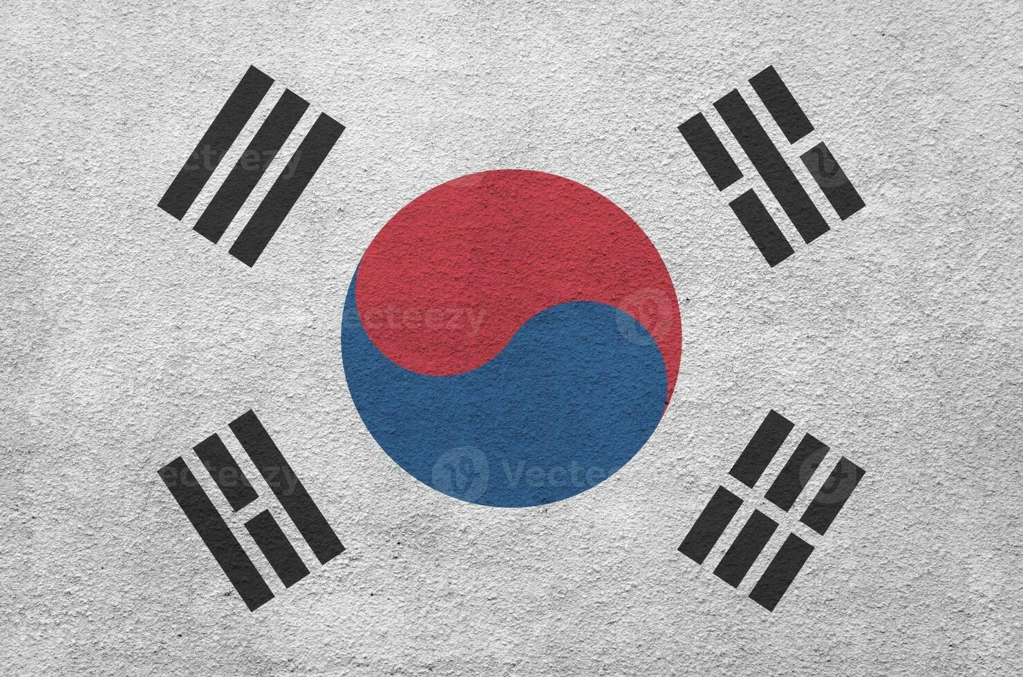 südkorea-flagge in hellen farben auf alter reliefputzwand dargestellt. strukturierte Fahne auf rauem Hintergrund foto