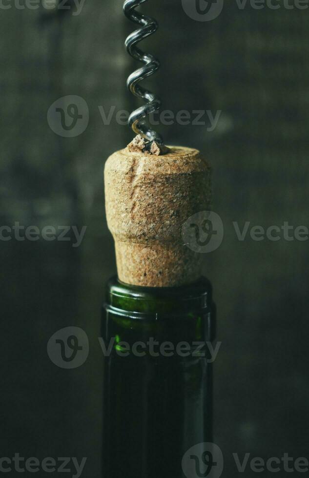 Korkenzieher und Flasche Hintergrund foto