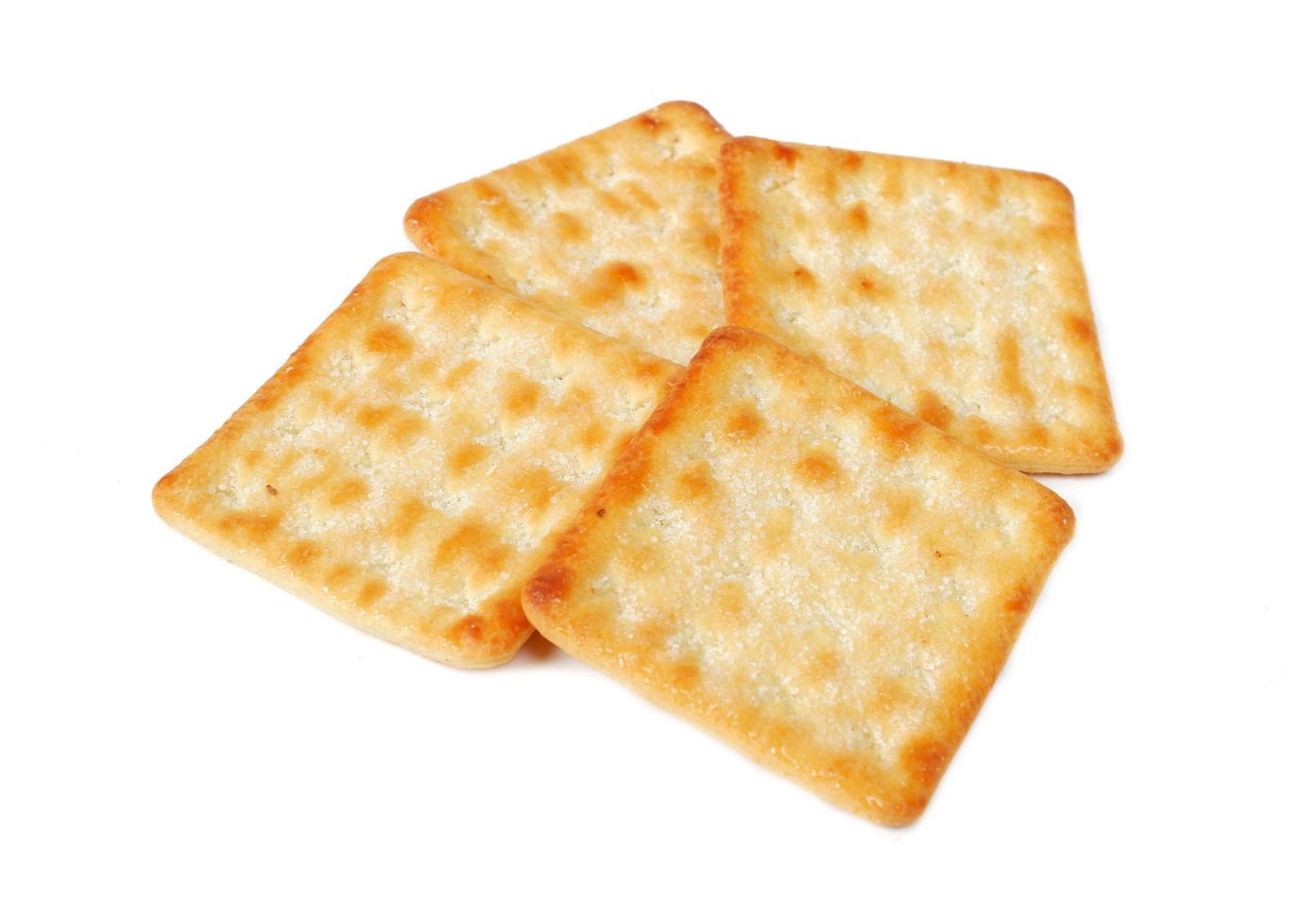 knuspriger Cracker mit Zucker isoliert auf weißem Hintergrund foto