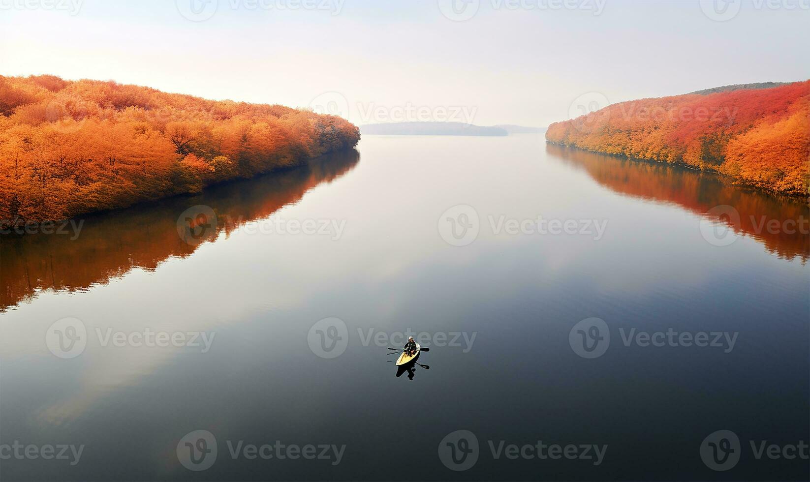 Antenne Aussicht von ein Person Rudern auf ein Ruhe See im Herbst. ai generiert foto