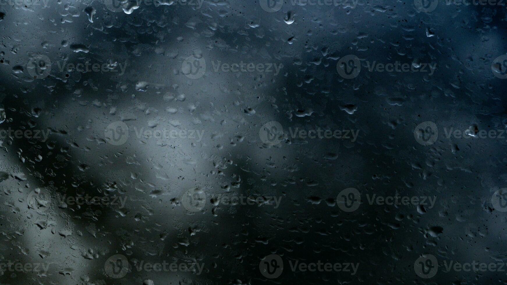 Regen Wasser Tropfen auf Glas foto