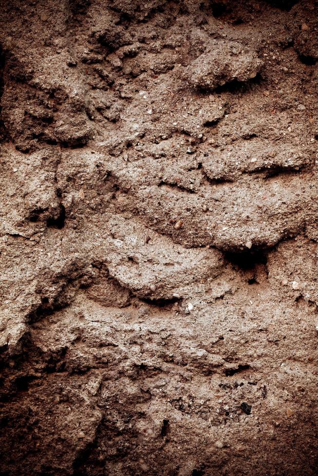 schmutziger Grunge-Steinmauer-Hintergrund foto