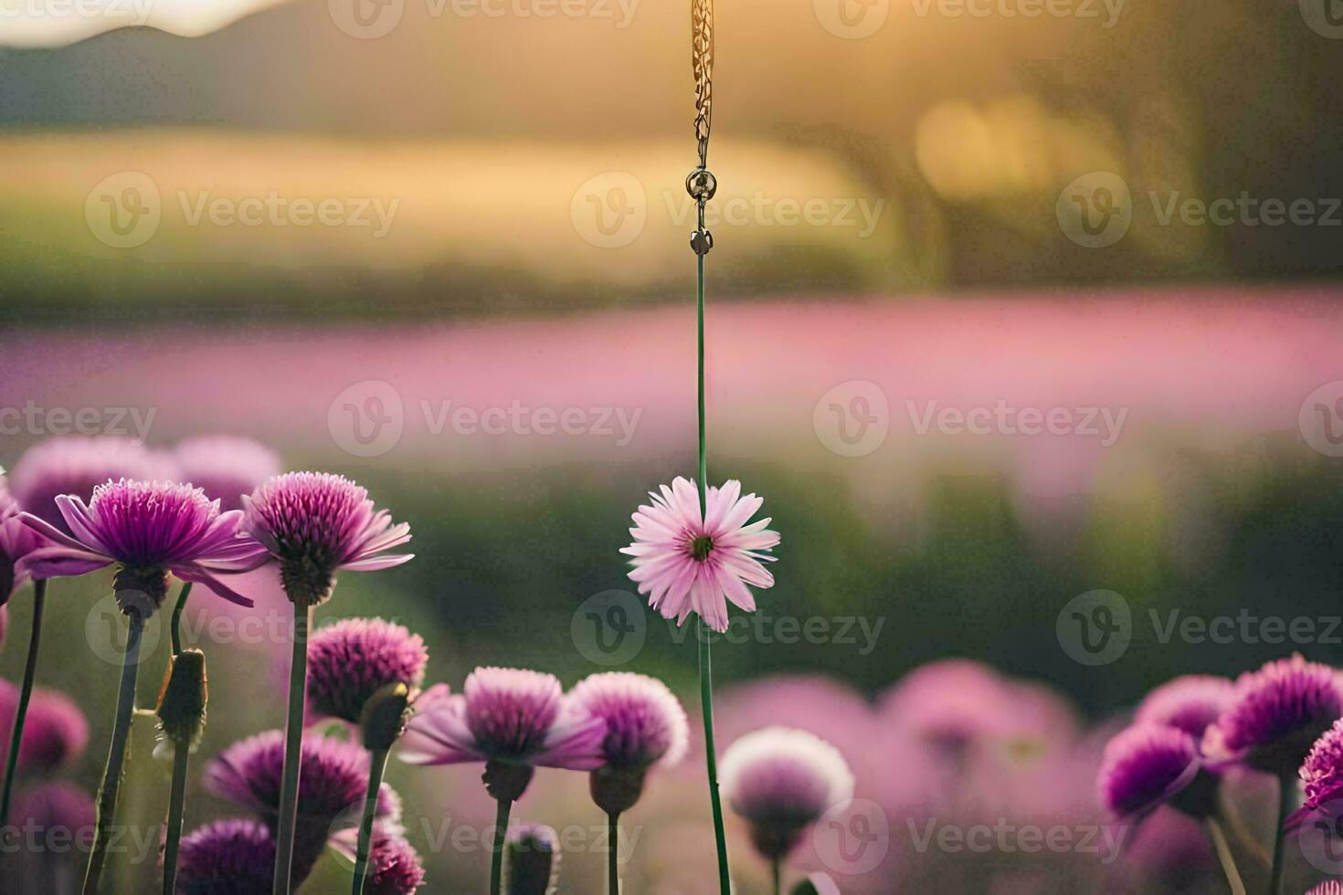 ein Blume hängend von ein Kette im ein Feld. KI-generiert foto